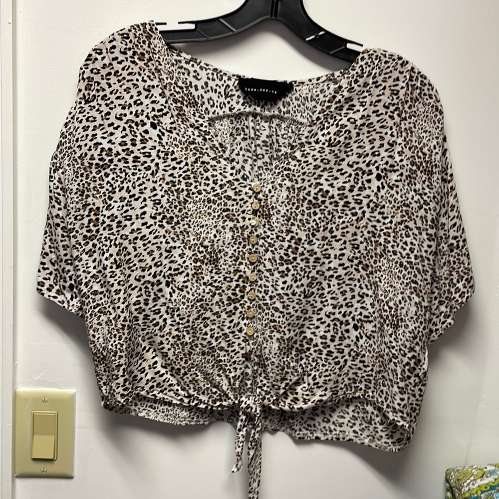 Know. One. Cares. Leopard top